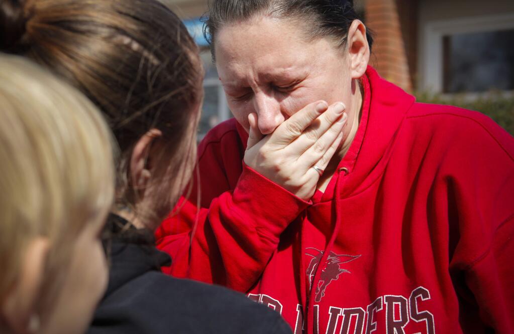 Michelle Brown, who was recently forced to leave the COTS family shelter in Petaluma where she was staying with her son, says goodbye to her friends. (CRISSY PASCUAL/ARGUS-COURIER STAFF)