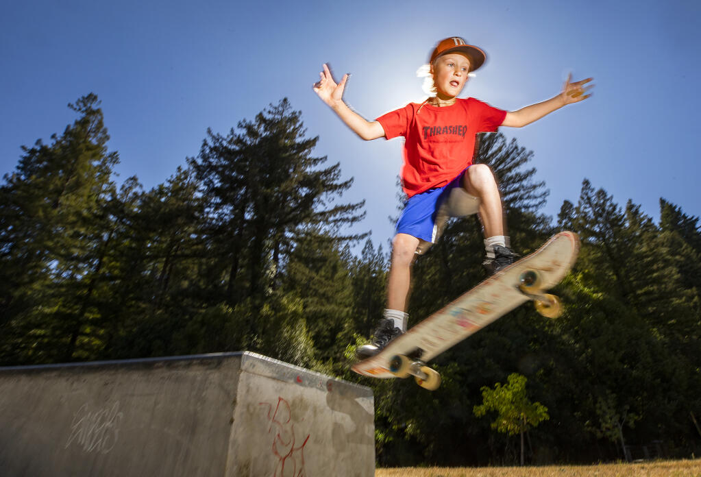Kohlten Figoni, 8, tries a trick in the skatepark at Creekside Park in Monte Rio on Wednesday, May 26, 2021. (Photo by John Burgess/The Press Democrat)