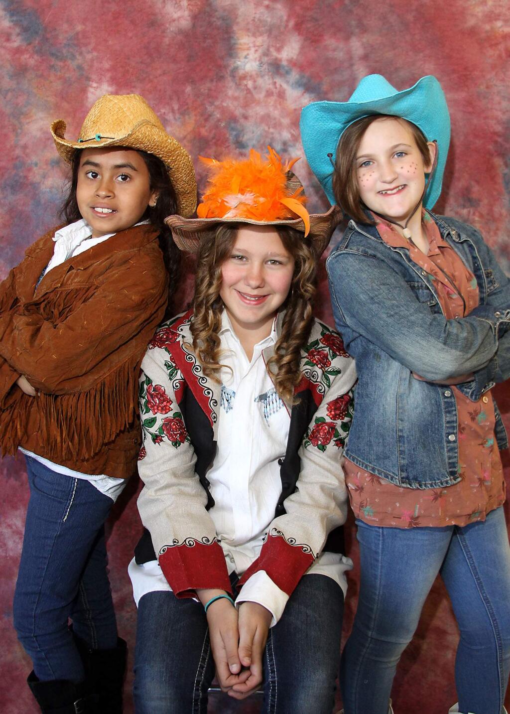 Dunbar Elementary fifth graders Escarly Vazquez as Big Bertha, Carlie Maxwell as Miss Abigail, and Grace Atkinson as Clemmie Clementine.