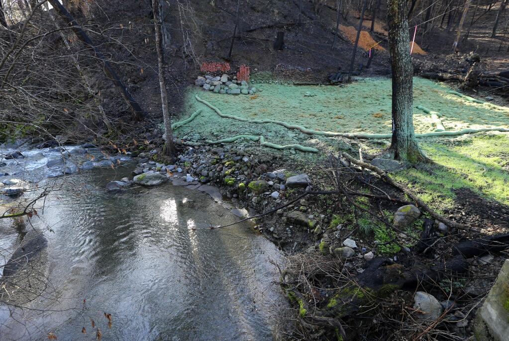 Many Anderson Springs residents may be unable to rebuild because their homes were too close to the creek, as were their septic systems. The lots there are so tiny, there's no way for some to do the legal setbacks required by the state. (JOHN BURGESS / The Press Democrat)