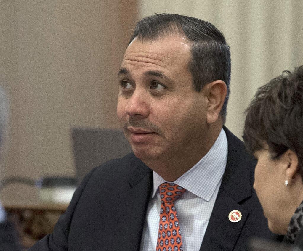 FILE - In this Aug. 26, 2016, file photo, state Sen. Tony Mendoza, D-Artesia, listens at the Capitol in Sacramento, Calif. The Los Angeles-area state senator is being investigated for allegations he engaged in inappropriate behavior toward a young female staffer. A Senate spokesman says Mendoza has been the target of an internal investigation for six weeks. (AP Photo/Rich Pedroncelli, File)