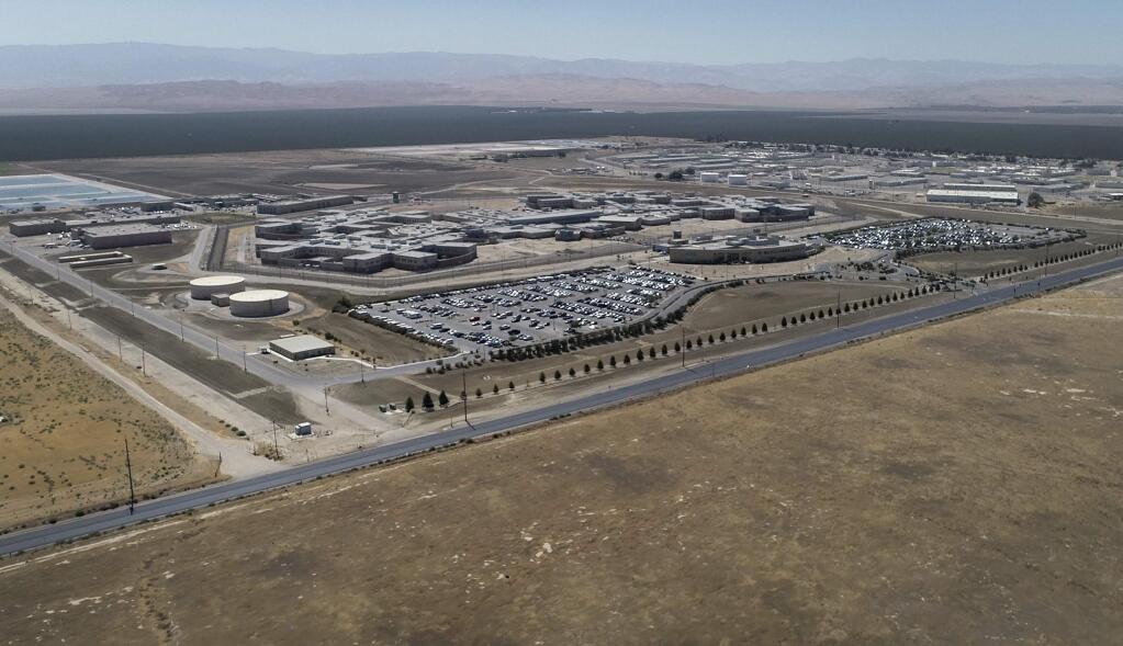 The Coalinga State Hospital, which houses sexually violent predators, is shown near Coalinga, Calif., Sept. 16, 2018. About 30 men in the country illegally and with sex crime records remain in custody despite having completed their sentences and wanting to be deported. (Craig Kohlruss/Fresno Bee via AP)