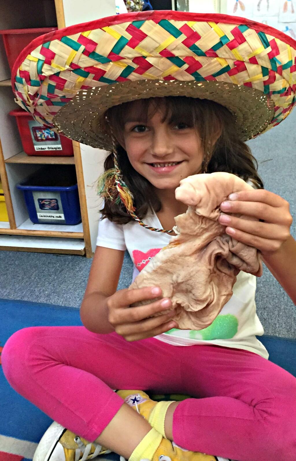 Submitted photoPrestwood kindergartner Malindi Wilkens holds a pig's stomach.