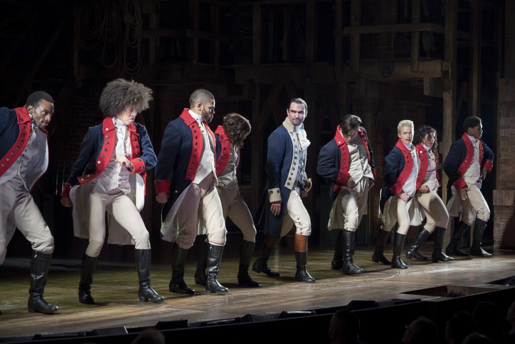 FILE -- Javier Munoz, center, as Alexander Hamilton in the musical ‘'Hamilton'' at the Richard Rodgers Theater in New York on Nov. 15, 2015. ‘'Hamilton'' grossed $3.3 million for 8 performances during the 2016 Thanksgiving week, setting a record for the most money ever made in a single week by a Broadway show. (Sara Krulwich/The New York Times)