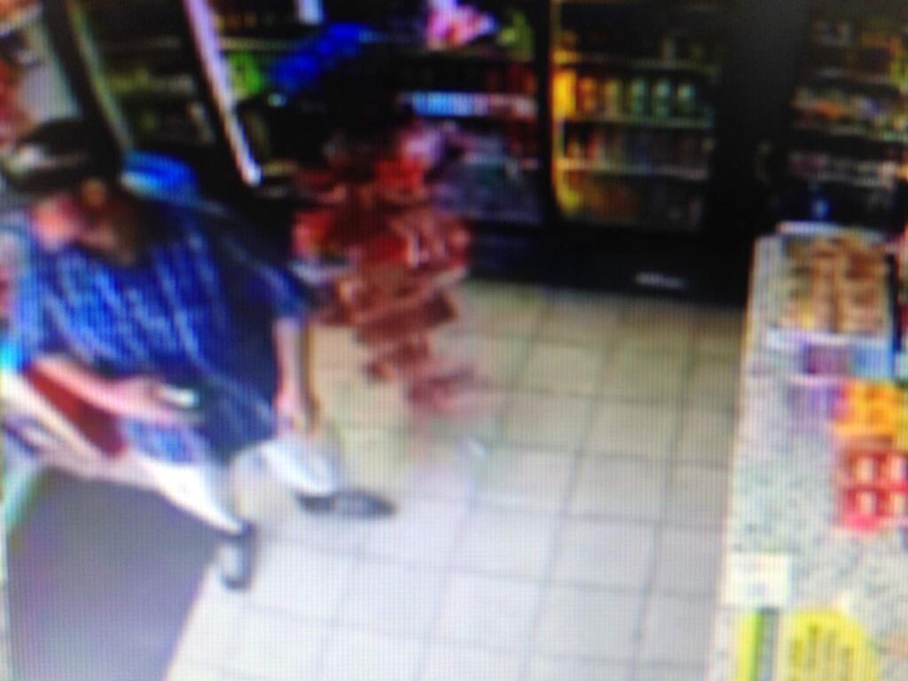 A surveillance video screen grab of a man suspected in the robbery of a Petaluma gas station on Monday, May 11, 2015. (PETALUMA POLICE DEPARTMENT)