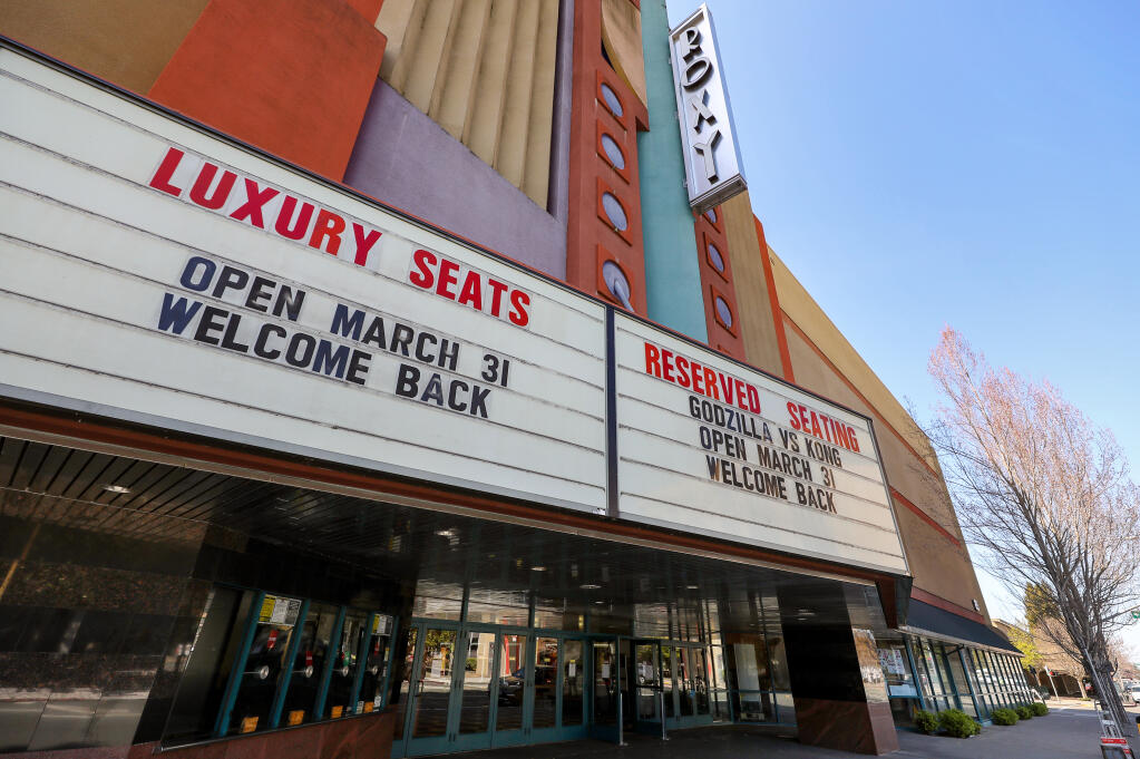 The marquee at the Roxy Stadium 14 movie theater welcomes audiences back for their reopening in Santa Rosa on Monday, March 29, 2021.  (Christopher Chung/ The Press Democrat)