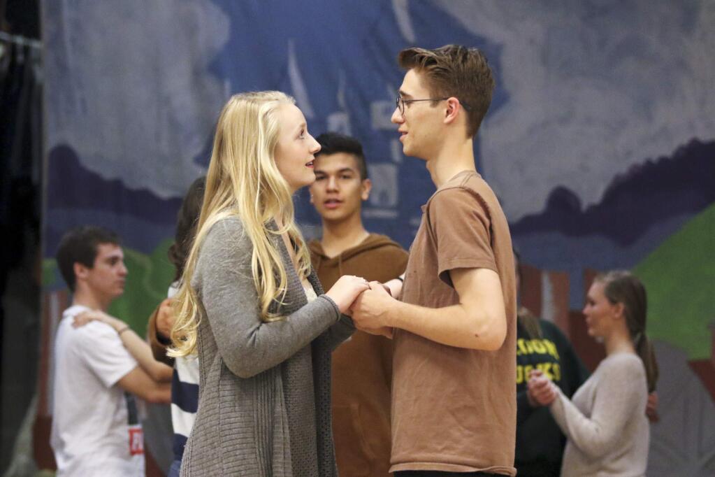 Cinderella played by Nicoline Pedersen and the Prince played by Andy Spring reherse along with the rest of the cast at Petaluma High School on Monday, April 6, 2015, for their upcoming performance of Cinderella . (SCOTT MANCHESTER/ARGUS-COURIER STAFF)