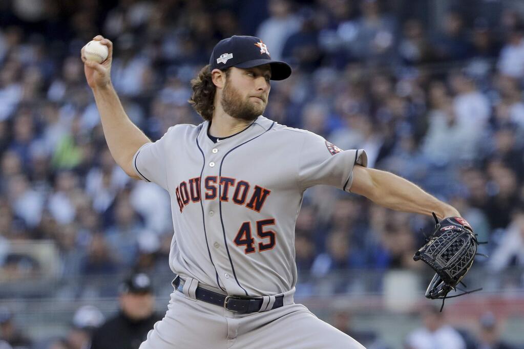 Houston Astros starting pitcher Gerrit Cole delivers against the New York Yankees during the first inning of Game 3 of the American League Championship Series, Tuesday, Oct. 15, 2019, in New York. (AP Photo/Frank Franklin II)