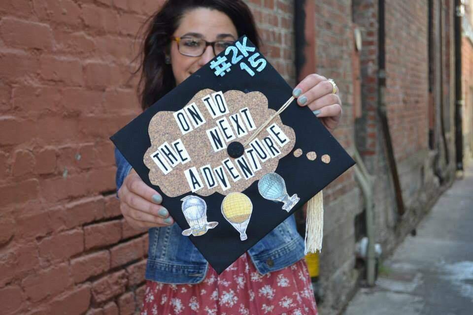 Sonoma State University graduate Brittany Solinger holds out her decorated mortarboard for SSU's Grad Cap Contest. (FACEBOOK.COM)