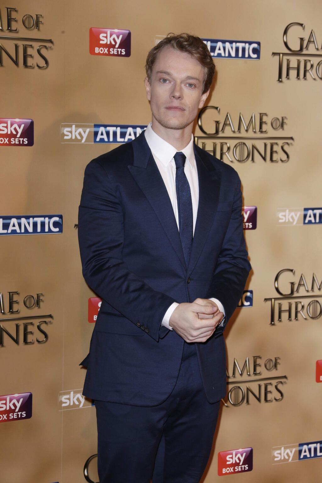 Alfie Allen poses for photographers upon arrival at the Tower of London for the world premiere of Game of Thrones, season 5, in London Wednesday, March 18, 2015. (Photo by Joel Ryan/Invision/AP)