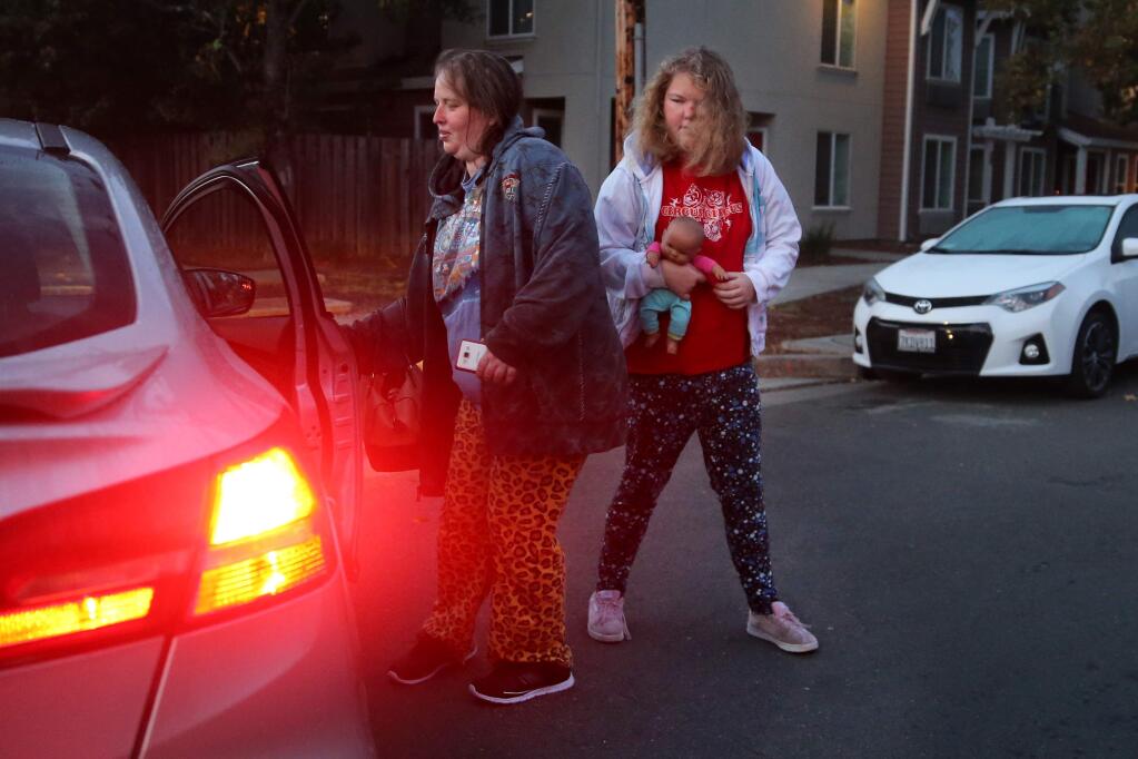 Michelle Petersen and her 19-year-old daughter Jocelyn take an Uber to Jocelyn's doctor's appointment in Santa Rosa on Tuesday, October 23, 2018. (BETH SCHLANKER/ The Press Democrat)