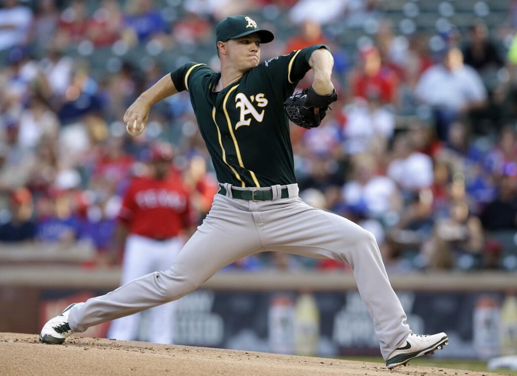 Oakland Athletics starting pitcher Sonny Gray delivers to the Texas Rangers in the first inning of a baseball game, Saturday, July 26, 2014, in Arlington, Texas. (AP Photo)