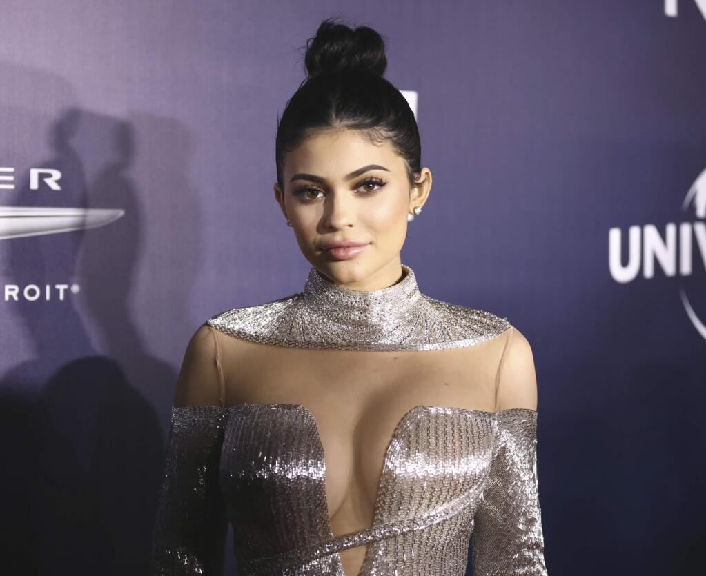 FILE - In this Jan. 8, 2017, file photo, Kylie Jenner arrives at the NBCUniversal Golden Globes afterparty at the Beverly Hilton Hotel in Beverly Hills, Calif. (Photo by Rich Fury/Invision/AP, File)
