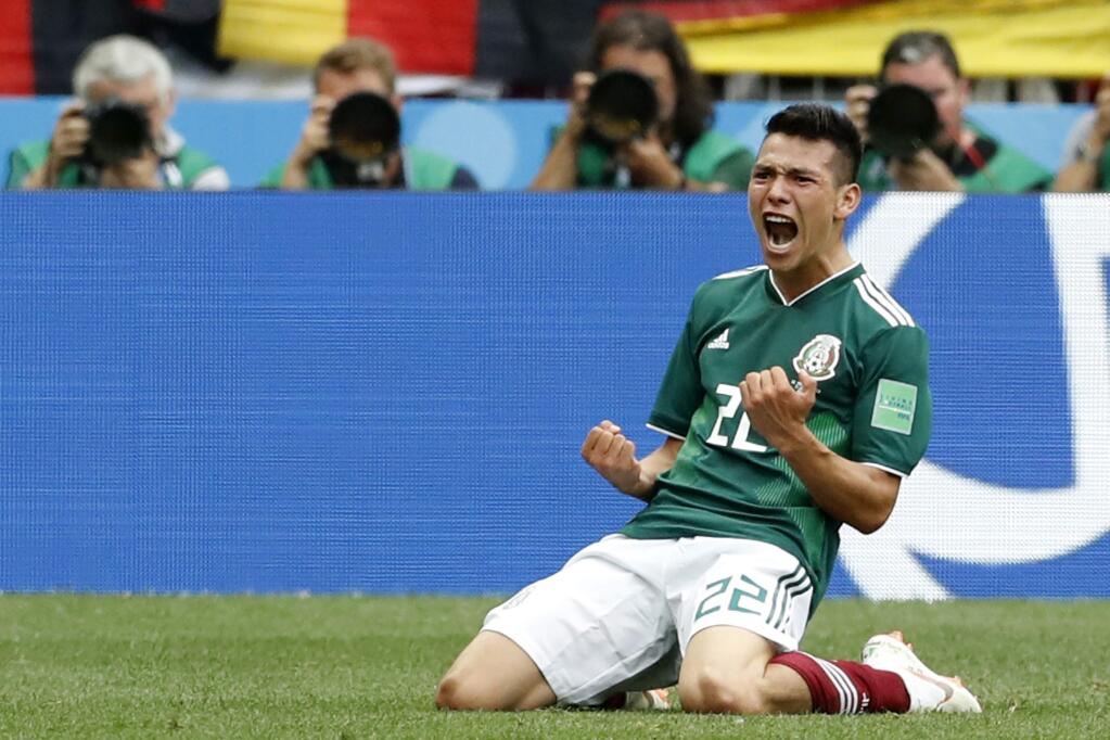 Mexico's Hirving Lozano, celebrates scoring his side's opening goal during the group F match between Germany and Mexico at the 2018 soccer World Cup in the Luzhniki Stadium in Moscow, Russia, Sunday, June 17, 2018. (AP Photo/Antonio Calanni)