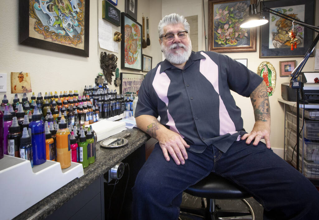 Shotsie Gorman in his tattoo studio. He will now be able to open his business designing and applying custom tattoos, from his shop on Highway 12 in Boyes Hot Springs. His business has been closed for seven months because of COVID-19. (Photo by Robbi Pengelly/Index-Tribune)