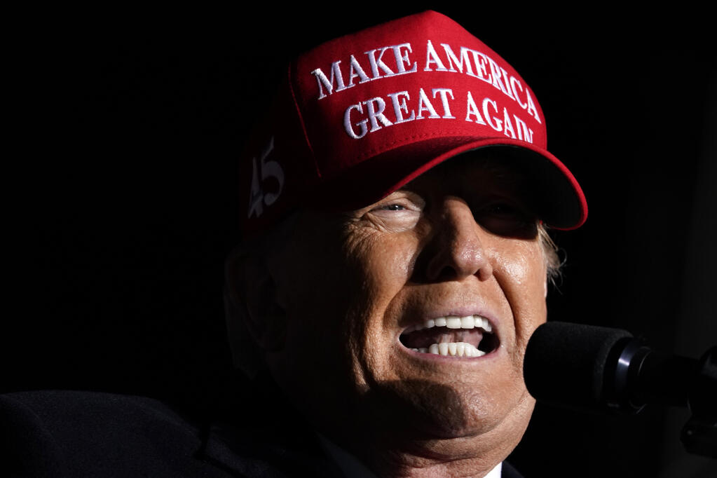 Former President Donald Trump speaks during a rally, Thursday, Nov. 3, 2022, in Sioux City, Iowa. (AP Photo/Charlie Neibergall)