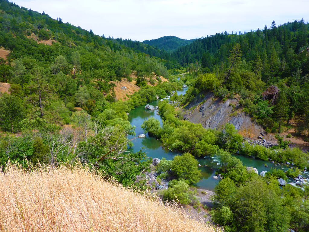 Eleven miles of Eel River watershed are included in 5,620 acres of land newly protected under conservation easement held by the Mendocino Land Trust as part of Pacific Gas & Electric Company's 2003 bankruptcy settlement. The settlement, in part, required permanent protection of 140,000 acres of sensitive watershed lands surrounding PG&E hydroelectric facilities. The acreage includes the bed and shoreline of Lake Pillsbury, riverside land along most of the Eel River between the lake and the Potter Valley hydroelectric plant, and the property around the plant itself. (Gregg Young/Potter Valley Tribe)