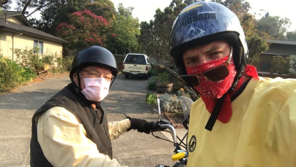 After hearing of the fire devastation on Monday morning, Max Heller and his father, Mark, went to check on houses and property for concerned friends. The two rode a 1983 Yamaha Virago through Fountaingrove, documenting the aftermath of the fires, Monday, Oct. 9, 2017. (Photo by Max Heller)