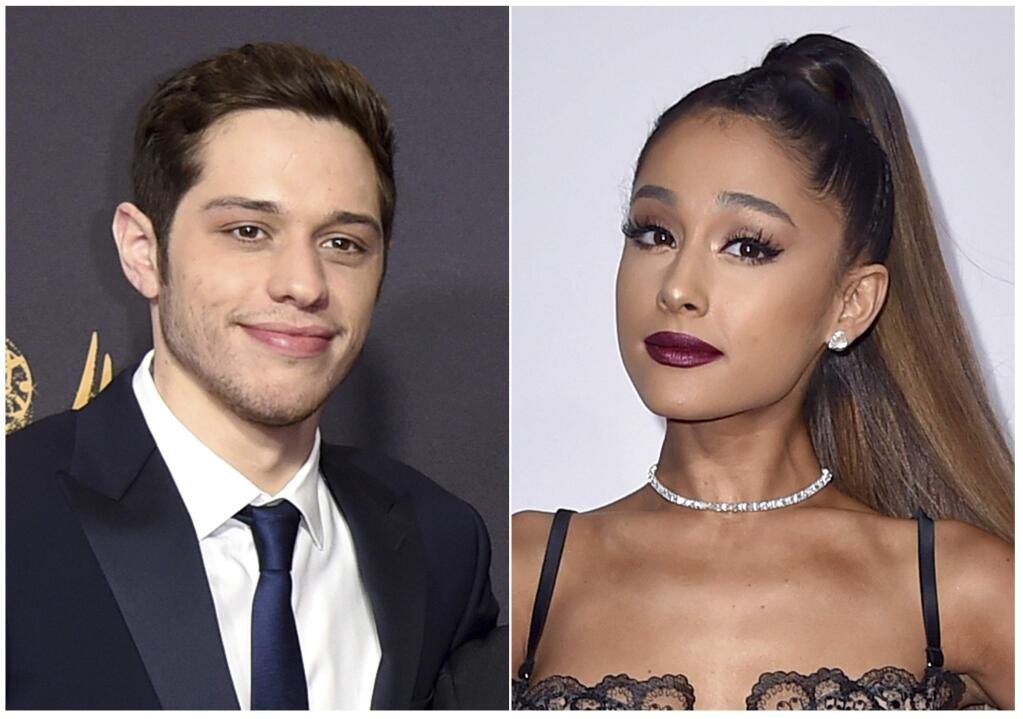 This combination photo shows comedian Pete Davidson at the 69th Primetime Emmy Awards in Los Angeles on Sept. 17, 2017, left, and singer Ariana Grande at the American Music Awards in Los Angeles on Nov. 20, 2016. During an appearance on 'The Tonight Show Starring Jimmy Fallon,' on Wednesday, June 20, 2018, Davidson confirmed that he is engaged to Grande. (AP Photo)