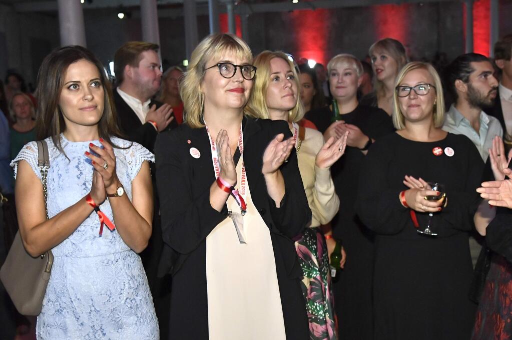 Supporters at the Social Democratic Party's election party in Stockholm in Stockholm, Sweden, Sunday Sept. 9, 2018. Polls have opened in Sweden's general election in what is expected to be one of the most unpredictable and thrilling political races in Scandinavian country for decades amid heated discussion around top issue immigration. (Claudio Bresciani/TT via AP)