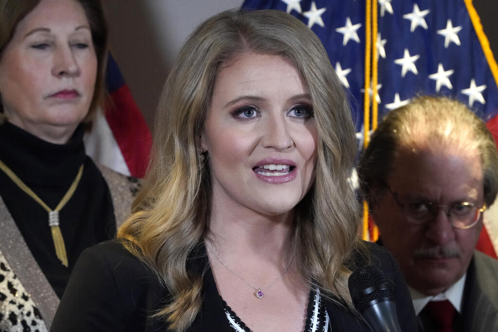 FILE - Jenna Ellis, a former member of then-President Donald Trump's legal team, speaks during a news conference at the Republican National Committee headquarters, Nov. 19, 2020, in Washington. Ellis has been formally censured by a judge after admitting she made repeated misstatements about the 2020 presidential election. Jenna Ellis acknowledged making 10 separate false statements on television and Twitter about the election. (AP Photo/Jacquelyn Martin, File)