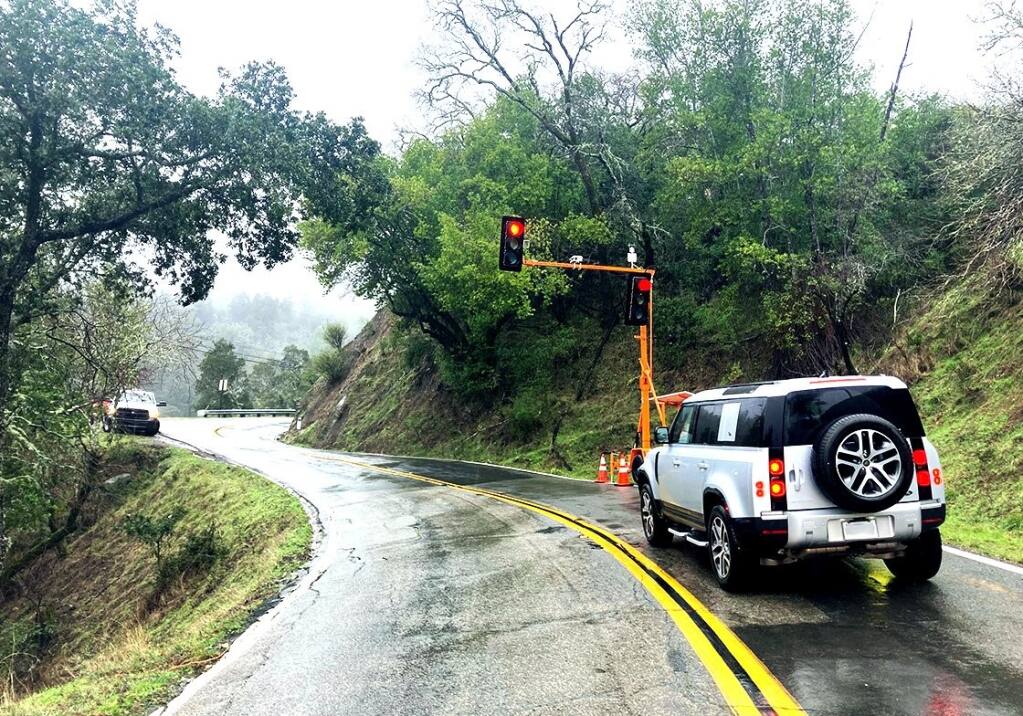 Traffic is limited to one lane on Bolinas Road in West Marin after a Jan. 9, 2023, storm brought down about 100 cubic yards, damaging the roadway. The damage is expected to take six months to fix. (Marin County Department of Public Works photo)