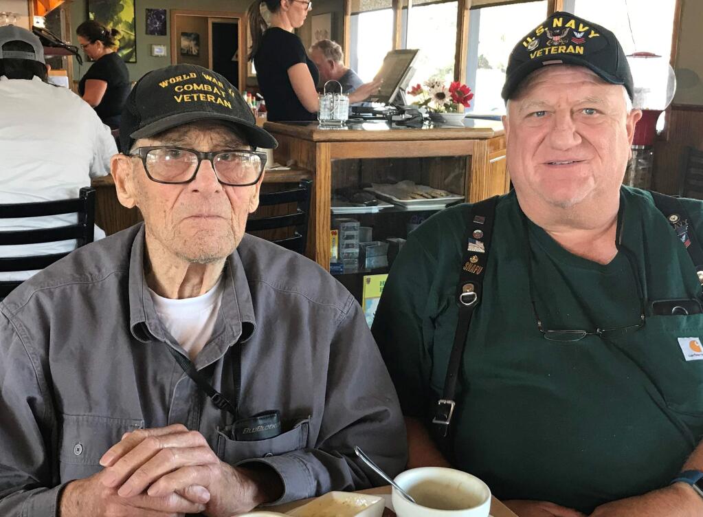 Petaluma WWII veteran Robert Banzet, left, with his son, Chris Banzet, also a Navy veteran. SCOTT BAKER