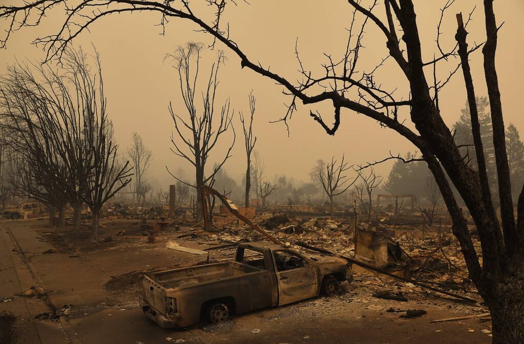 The neighborhood between Mark West Springs Road and Pacific Heights Drive was completely destroyed by the Tubbs Fire, in Santa Rosa on Tuesday, Oct. 10, 2017. (Christopher Chung/ The Press Democrat)