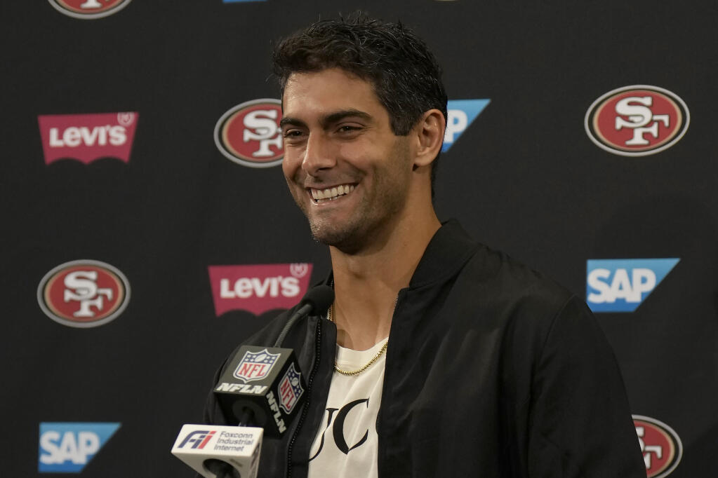 San Francisco 49ers quarterback Jimmy Garoppolo speaks at a news conference after an NFL football game between the 49ers and the Seattle Seahawks in Santa Clara, Calif., Sunday, Sept. 18, 2022. (AP Photo/Tony Avelar)