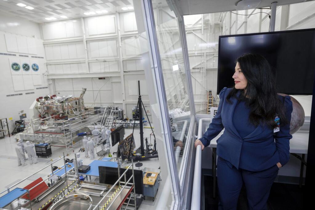 U.S. Poet Laureate Ada Limón is seen at NASA's Jet Propulsion Laboratory in Pasadena, Calif. on Thursday, Jan. 19, 2023. Limón wrote a new poem for an upcoming NASA mission to Jupiter's moon Europa. "In Praise of Mystery: A Poem for Europa" will be engraved on the Europa Clipper spacecraft. NASA expects to launch the mission in October 2024. (Gregory M. Waigand/NASA via AP)