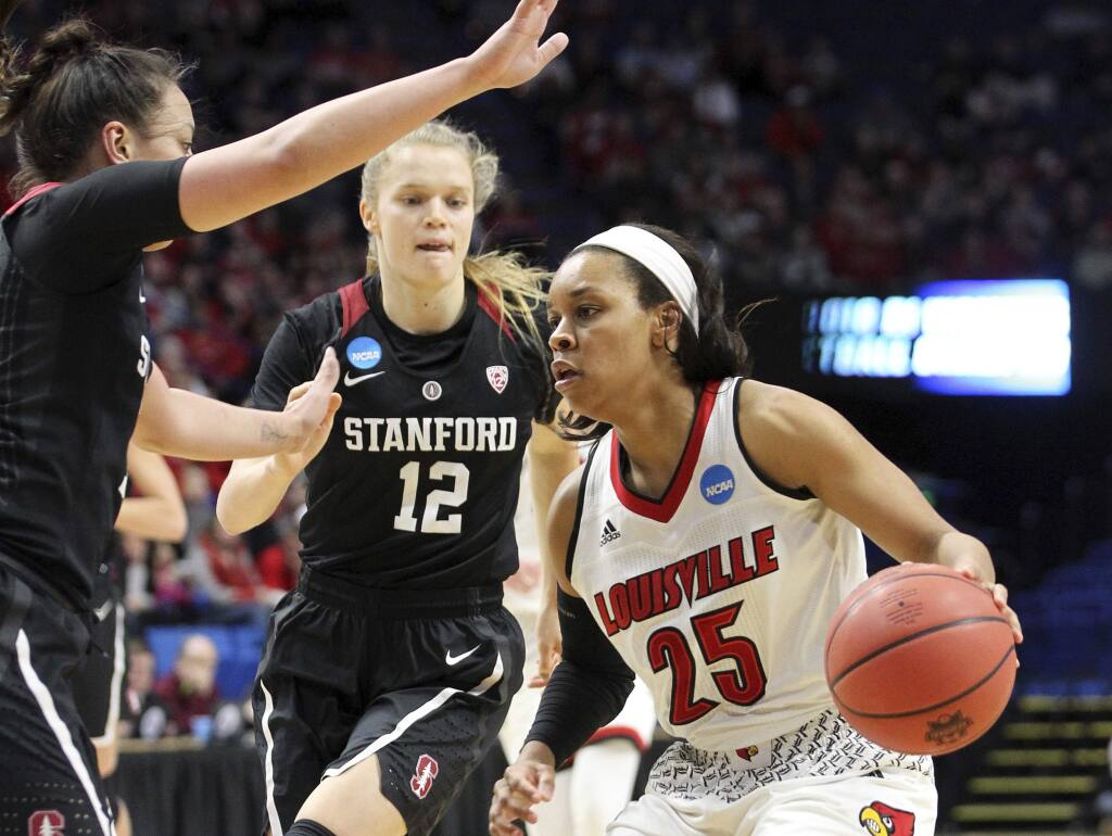 Louisville's Asia Durr (25) looks for an opening as Stanford's Kaylee Johnson, left, and Brittany McPhee defend during the first half of an NCAA tournament regional semifinal Friday, March 23, 2018, in Lexington, Ky. (AP Photo/James Crisp)