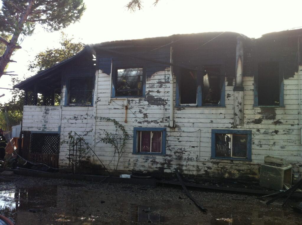 A house on Healdsburg Avenue in Geyserville was damaged by fire on Tuesday, Nov. 4, 2014. (BETH SCHLANKER/ PD)