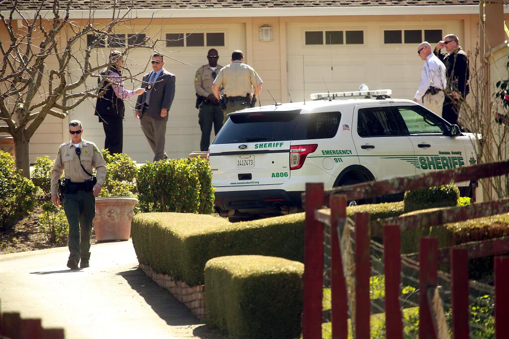 The Sonoma County Sheriff's Office investigates a possible homicide in a ranch home on Rose Avenue near Penngrove on Thursday, Feb. 26, 2015. (JOHN BURGESS / The Press Democrat)