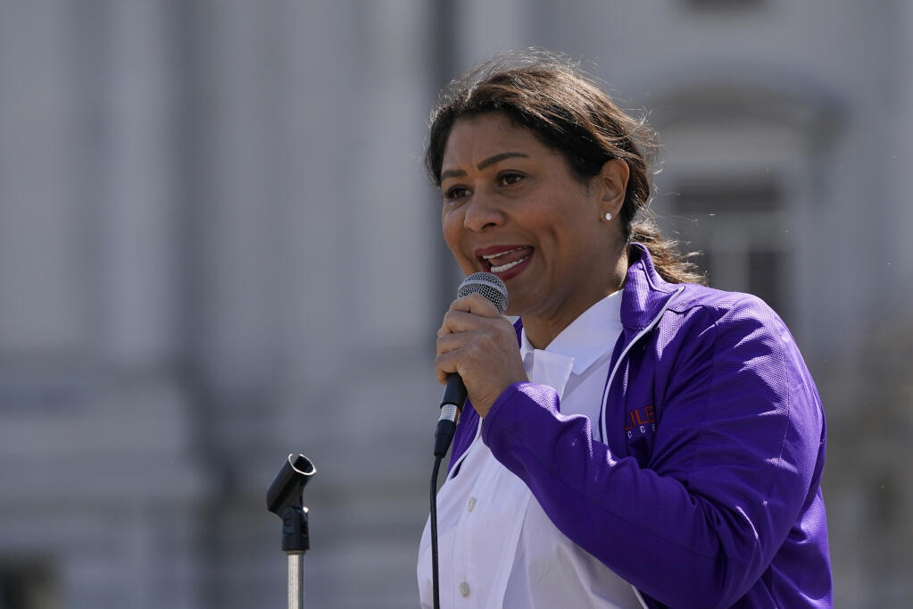 FILE â€” In this March 13, 2021 file photo Mayor London Breed speaks at a rally in San Francisco. The San Francisco Chronicle reported that Breed, who has promoted restrictive measures aimed at curbing the coronavirus, was spotted at the Black Cat nightclub, Wednesday Sept. 15, 2021, dancing and singing without a mask, despite a strict city order to wear masks when inside. (AP Photo/Jeff Chiu, File)