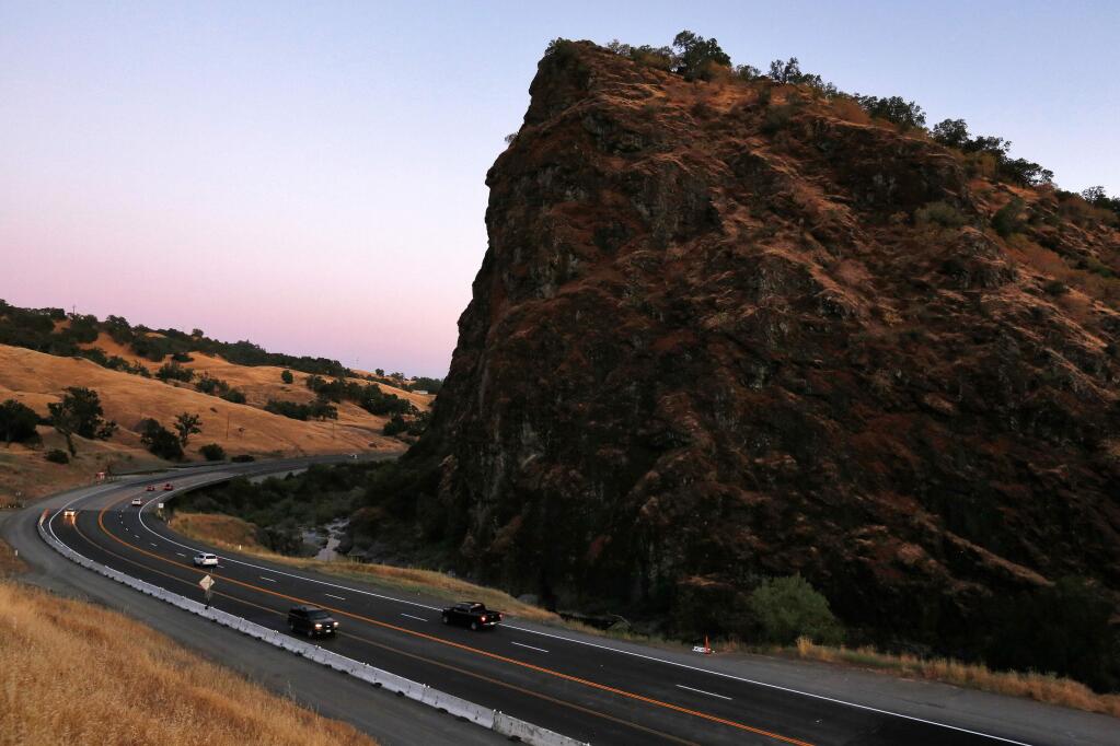 Motorists drive along Highway 101 around Frog Woman Rock near Hopland, California, on Thursday, June 28, 2018. (Alvin Jornada / The Press Democrat)