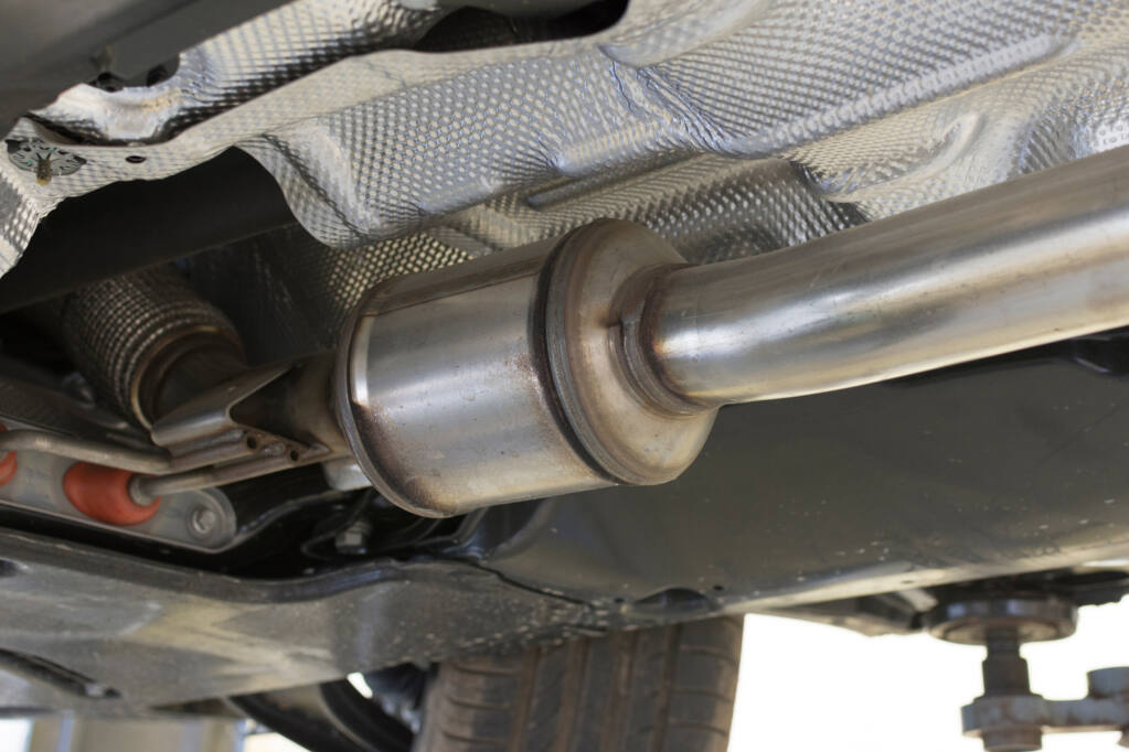 A catalytic converter beneath the carriage of a modern car. (Shutterstock)