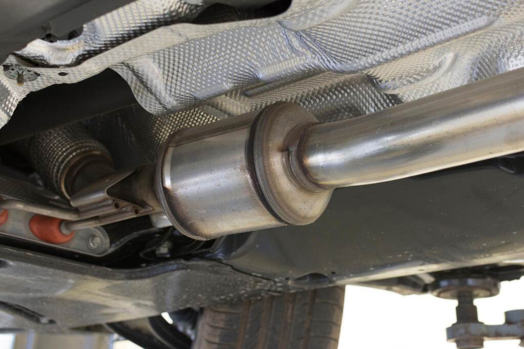 A catalytic converter beneath the carriage of a modern car. (Shutterstock)