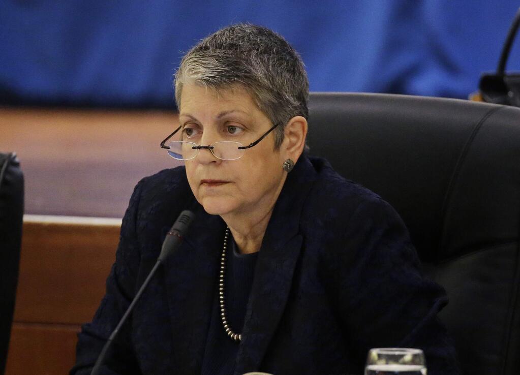 FILE - In this May 18, 2017 file photo University of California President Janet Napolitano listens during a meeting of the Board of Regents in San Francisco. The University of California has sued the Trump administration over its decision to end a program protecting hundreds of thousands of young immigrants from deportation. The lawsuit filed on Friday, Sept. 8 in federal court in San Francisco includes university president Napolitano as a plaintiff. (AP Photo/Eric Risberg, File)