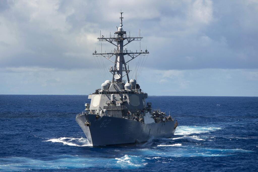 In this Aug. 20, 2013 photo, the guided-missile destroyer USS Fitzgerald (DDG 62) makes its way through the Pacific Ocean. The U.S. military said the Navy destroyer collided with a merchant ship off the coast of Japan and said there have been injuries. In a brief written statement, U.S. Pacific Fleet in Hawaii said the Navy has requested assistance from the Japanese Coast Guard. (Mass Communication Specialist 3rd Class Paul Kelly/U.S. Navy via AP)
