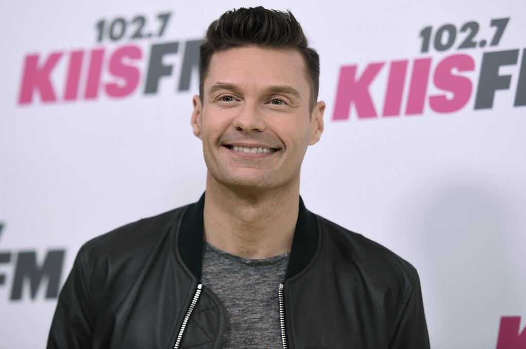 FILE - In a Saturday, May 13, 2017 file photo, Ryan Seacrest arrives at Wango Tango at StubHub Center, in Carson, Calif. Seacrest will be back hosting ‚ÄúAmerican Idol‚Äù when it returns for a first season on ABC. Kelly Ripa made the announcement Thursday, July 20, 2017, on ‚ÄúLive with Kelly and Ryan,‚Äù which she has co-hosted with Seacrest since he joined her in May. (Photo by Richard Shotwell/Invision/AP, File)