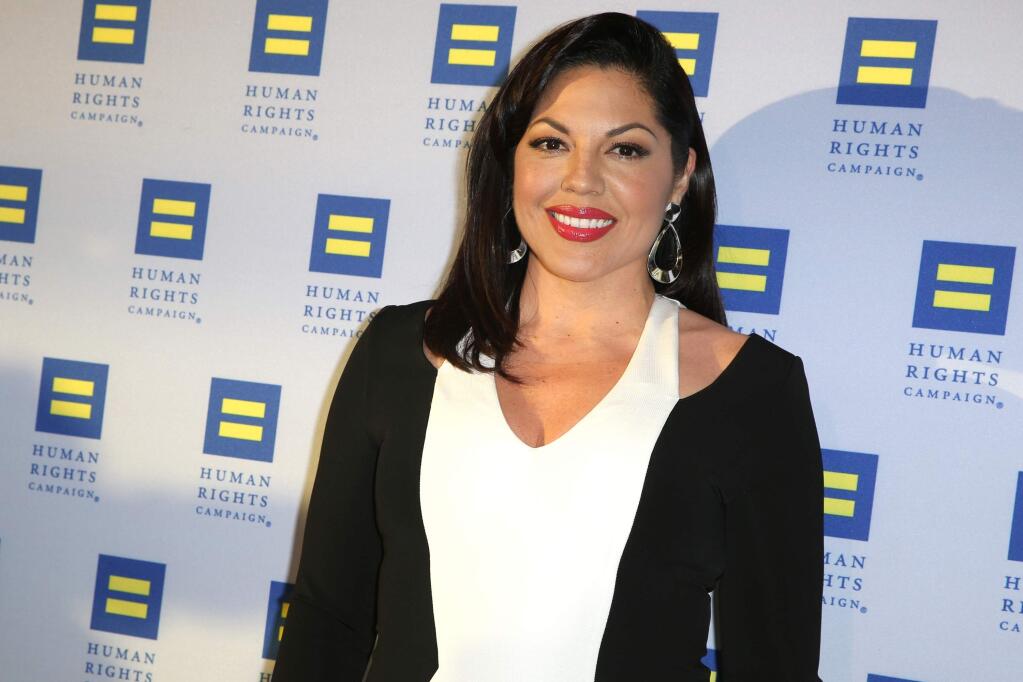 FILE - In this March 14, 2015 file photo, Sara Ramirez arrives at the 2015 Human Rights Campaign Gala Dinner at the JW Marriott LA Live in Los Angeles. Surgeon Callie Torres is turning in her scalpel at Grey Sloan Memorial Hospital. Ramirez, who plays Dr. Torres on 'Grey's Anatomy,' tweeted Thursday, May 19, 2016, that she's taking 'welcome time off' after 10 years with the ABC medical drama. (Photo by Rich Fury/Invision/AP, File)