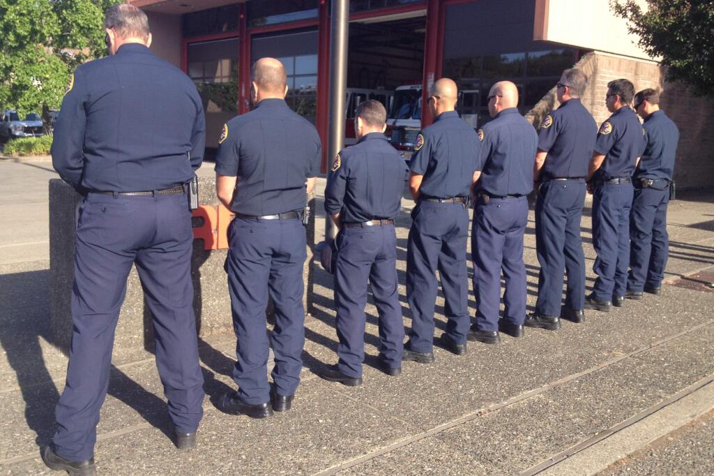 On Wednesday, June 29, 2016, firefighters across Santa Rosa stood in formation and observed a moment of silence for John Hurt, who 50 years ago became the city's only fireman killed on duty. (CHRIS SMITH/ PD)