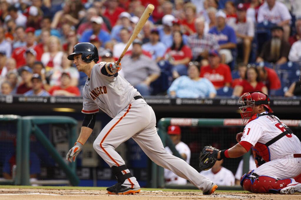 San Francisco Giants' Buster Posey at bat during the first inning of a baseball game against the Philadelphia Phillies, Wednesday, July 23, 2014, in Philadelphia. (AP Photo/Chris Szagola)