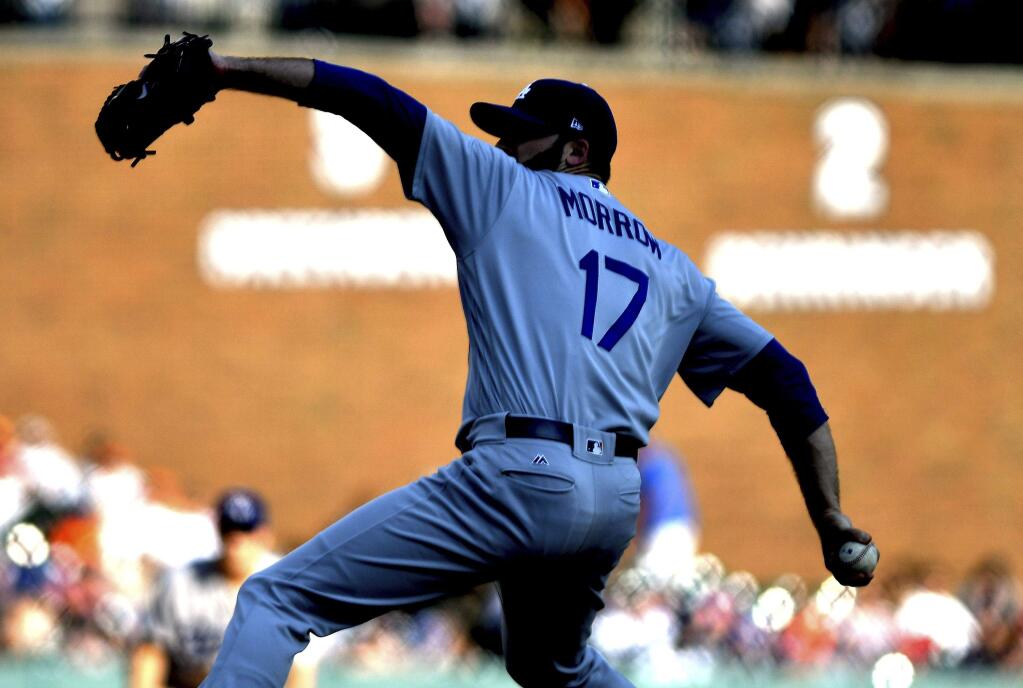 Los Angeles Dodgers relief pitcher Brandon Morrow throws in the eighth inning against the Detroit Tigers, Saturday, Aug. 19, 2017, in Detroit. (AP Photo/Lon Horwedel)
