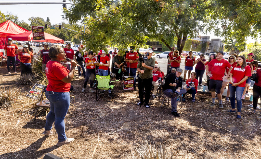 Emergency Room therapist Natalie Rogers speaks before Kaiser employees during a rally in front of the Santa Rosa hospital to support mental health employees demands for more staffing in the face of increased patients loads September 16, 2022.  (John Burgess/The Press Democrat)