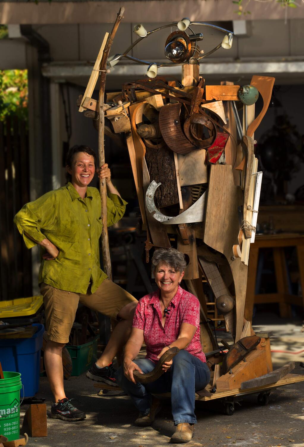 Santa Rosa artists Aileen Cormack, left, and Deborah Colotti are constructing a robot sculpture for the Burning Man festival using metal from a Coffey Park home burned in the October fires. (photo by John Burgess/The Press Democrat)
