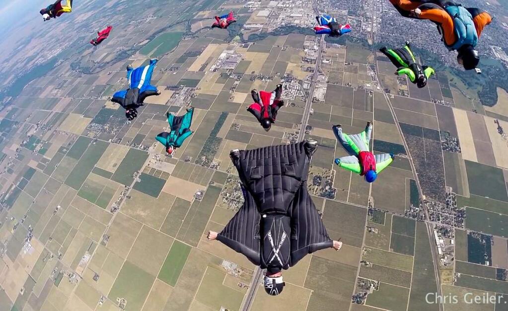 Parachuters in wingsuits over Lodi. (Chris Geiler / Skydive Lodi Parachute Center / Facebook)