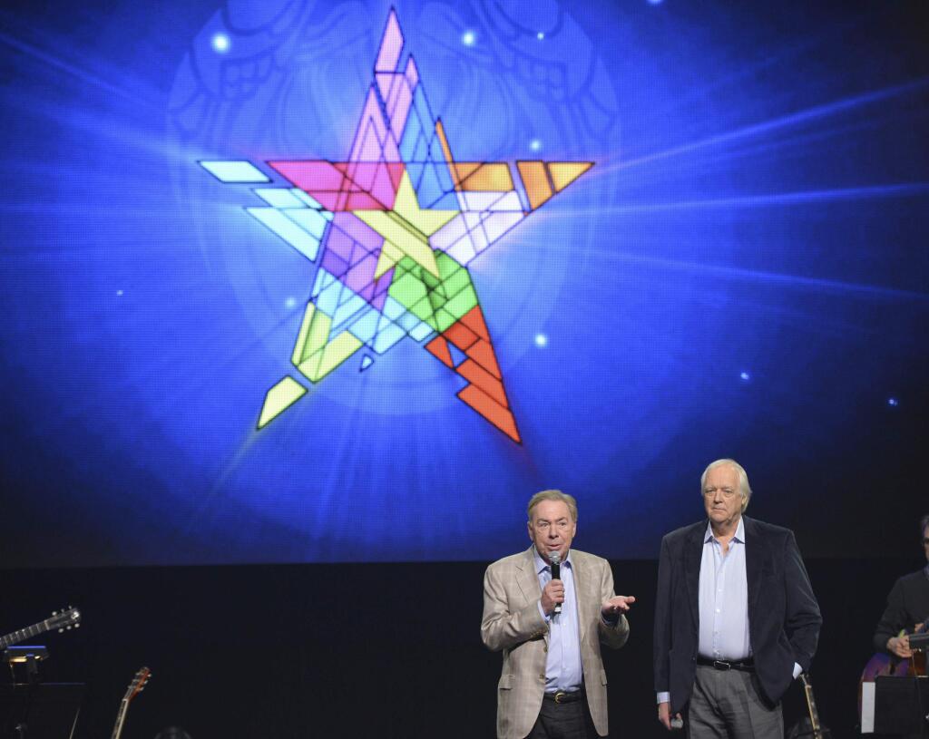 FILE - In this April 4, 2014 file photo, composer Andrew Lloyd Webber, left, and lyricist Tim Rice announce the new 'Jesus Christ Superstar' North American arena tour at a press conference in New York. NBC announced Wednesday, May 10, 2017, that it will bring to broadcast television “Jesus Christ Superstar Live!,” the iconic 1971 Broadway rock opera by Webber and Rice. They will serve as executive producers with Marc Platt, Craig Zadan and Neil Meron. (Photo by Evan Agostini/Invision/AP, File)