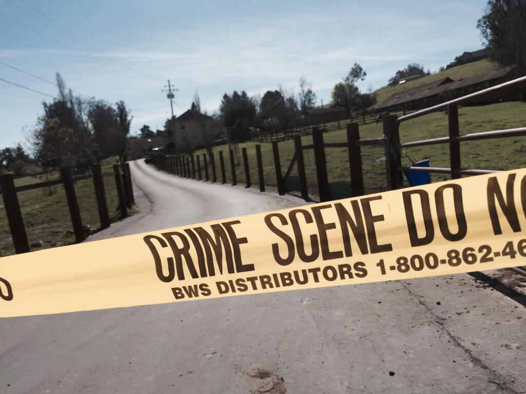 Crime scene tape surrounds the Penngrove home where Olga Dinelli was killed on Thursday, Feb. 26, 2015. (JOHN BURGESS/ PD)