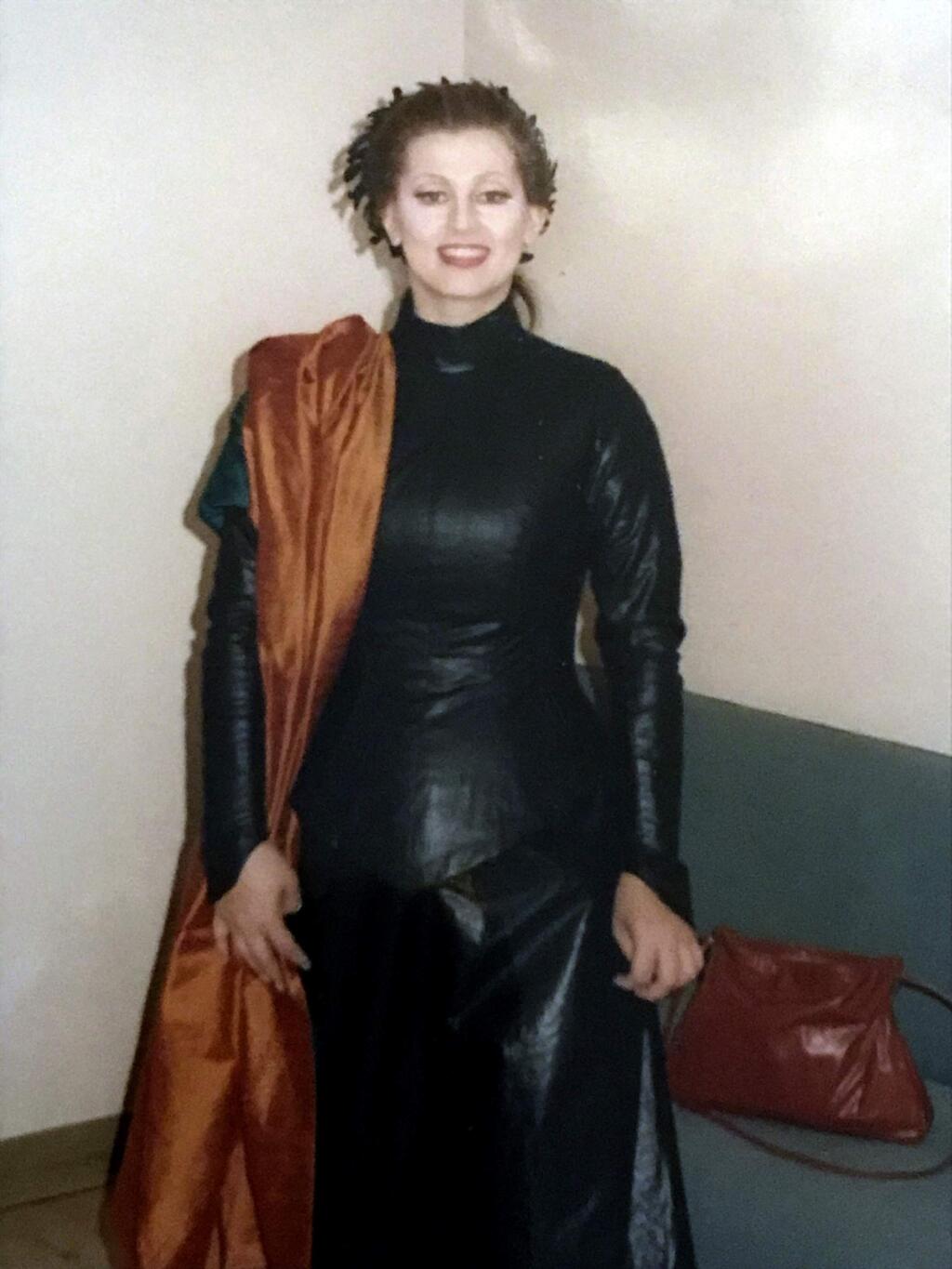 In this 1991 photo Paula Rasmussen poses while dressed for her part in 'Les Troyens' at the Los Angeles Opera. Rasmussen is one of four women who have accused renowned conductor Charles Dutoit of sexual misconduct that allegedly occurred on the sidelines of rehearsals or performances with some of America's great orchestras. Dutoit, 81, is the artistic director and principal conductor at London's Royal Philharmonic Orchestra. (Paula Rasmussen via AP)